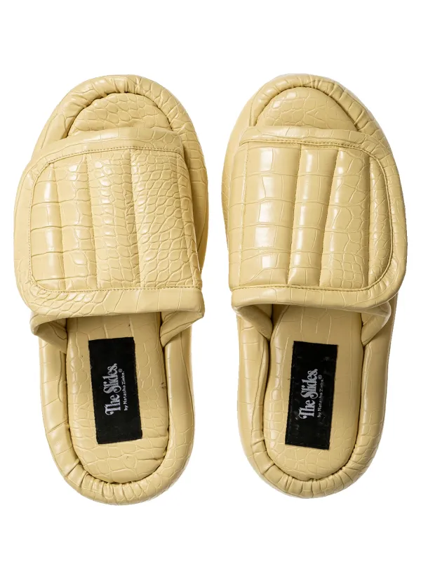 The Faux Leather Slides. sold by Natasha Zinko