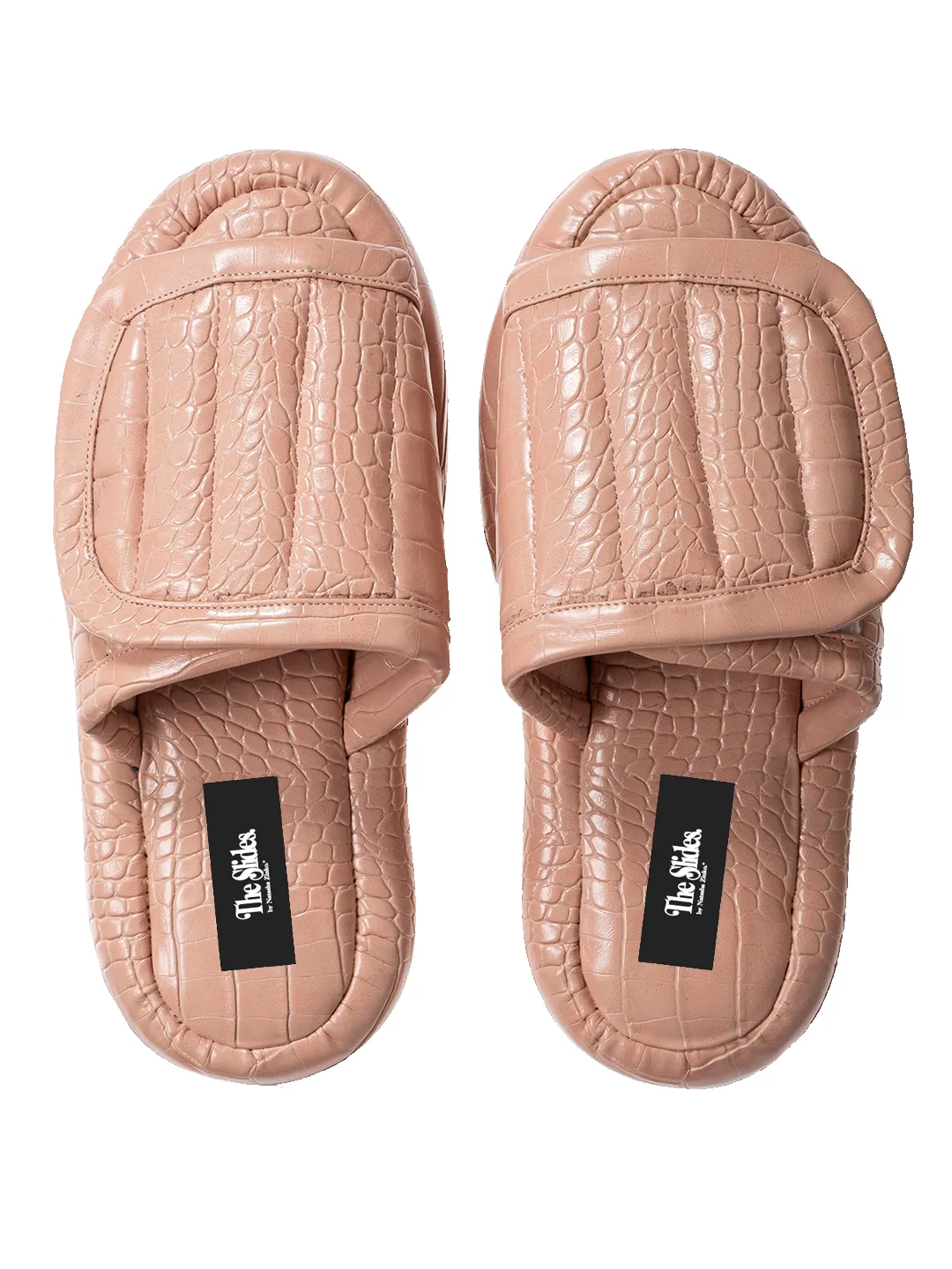 The Faux Leather Slides. sold by Natasha Zinko