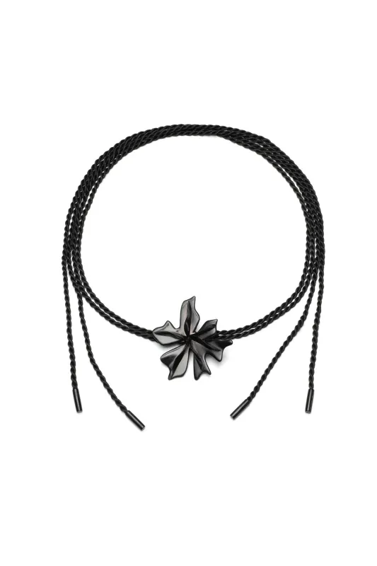 Buffalo Horn Floral Pendant Belt sold by Natori