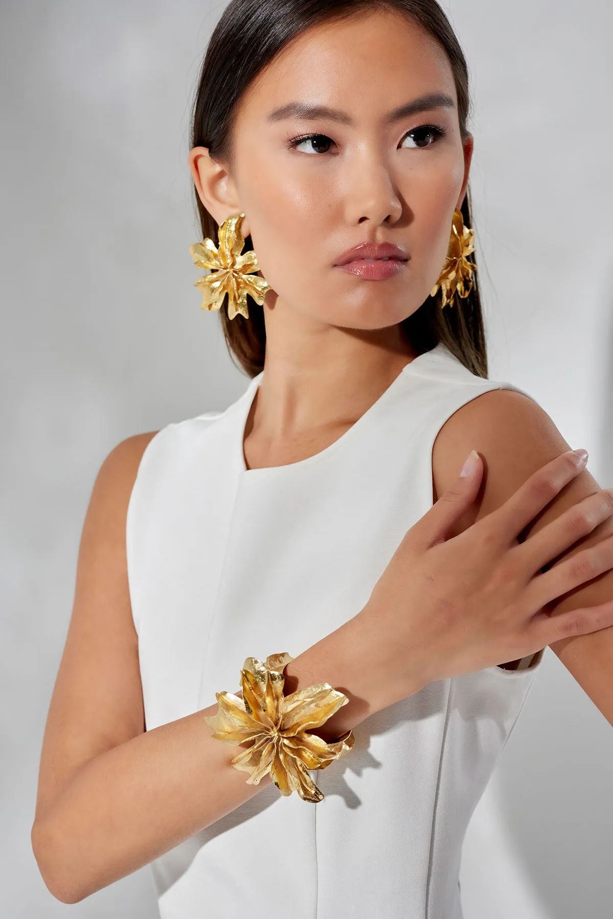 Compact Knit Asymmetrical Top sold by Natori