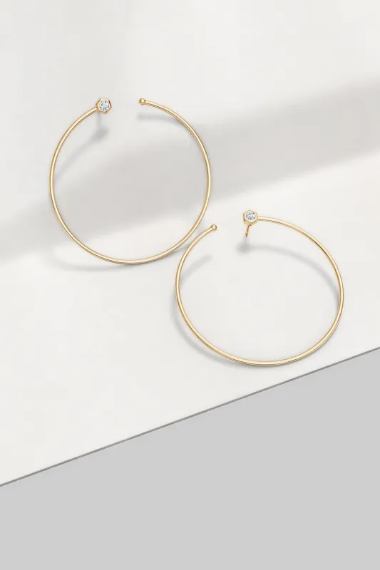 Indochine 14k Giant Diamond Side-Facing Open Hoop Earrings sold by Natori