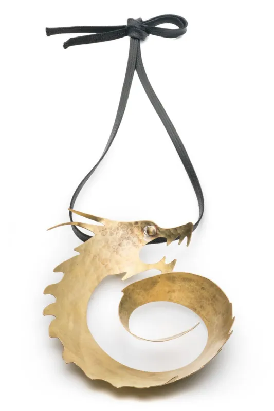 Hammered Brass Swirl Dragon Necklace sold by Natori