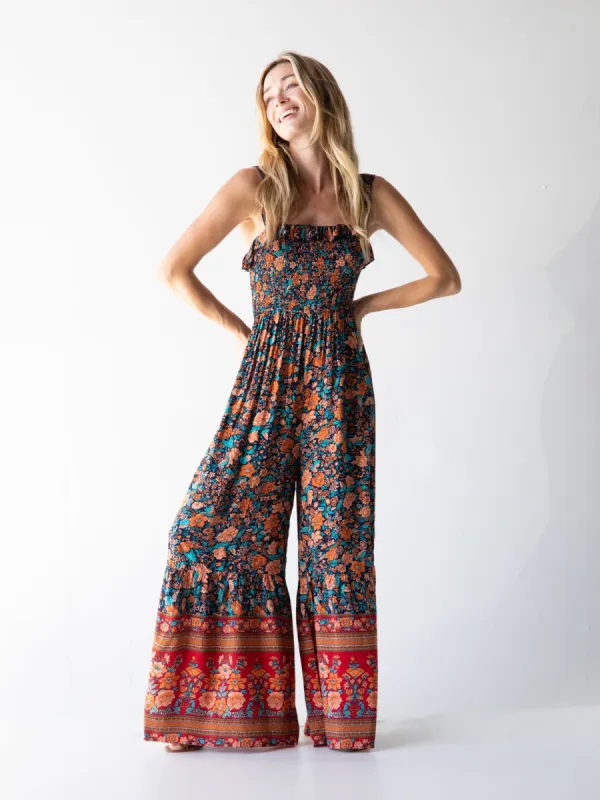 Megan Smocked Jumpsuit - Navy Red Floral Border sold by NATURAL LIFE