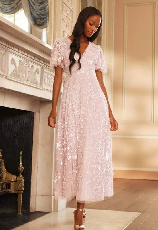 Trailing Bow Gown sold by Needle & Thread