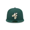 New Era Cap 70th Anniversary Green 59FIFTY Fitted Hat sold by New Era