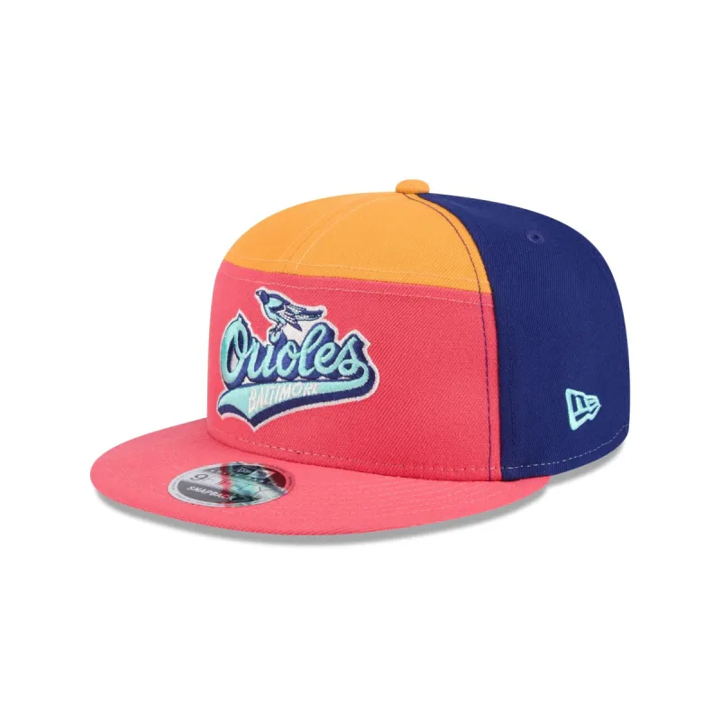 Baltimore Orioles Coral Split Panel 9FIFTY Snapback Hat sold by New Era