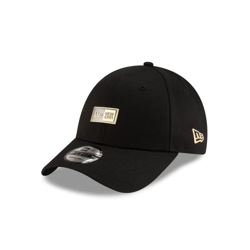 New Era Cap Badge Black 9FORTY Snapback Hat sold by New Era