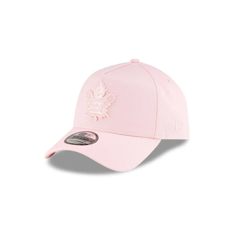Toronto Maple Leafs Pink 9FORTY A-Frame Snapback Hat sold by New Era