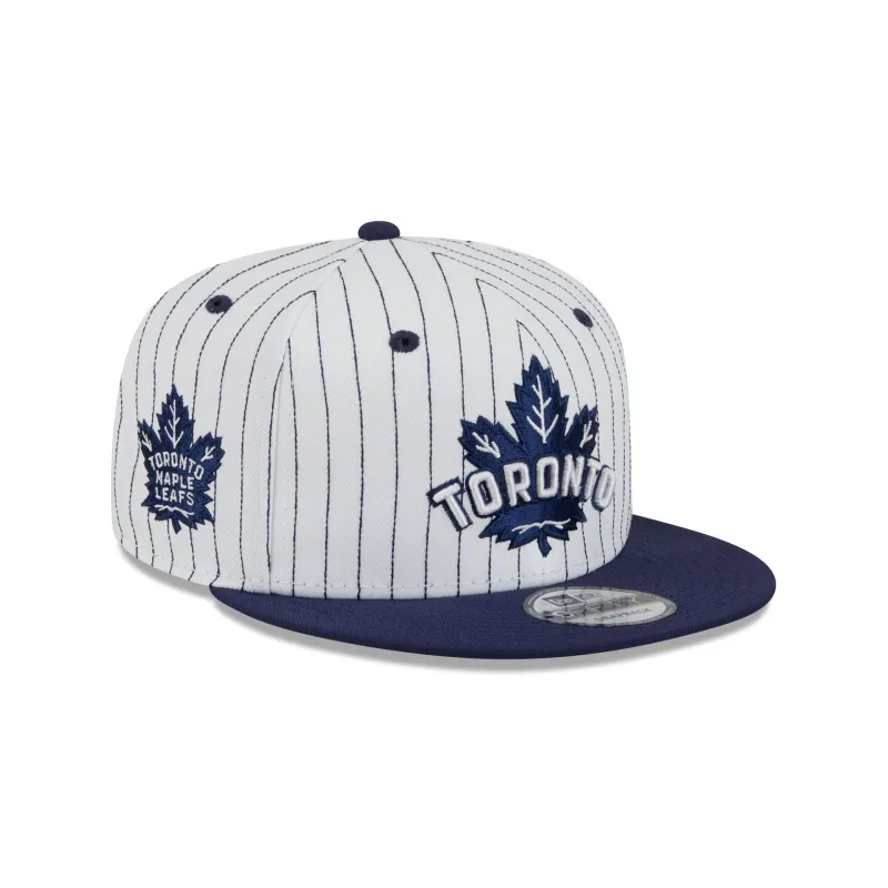 Toronto Maple Leafs Deceptor Pinstripe 9FIFTY Snapback Hat sold by New Era