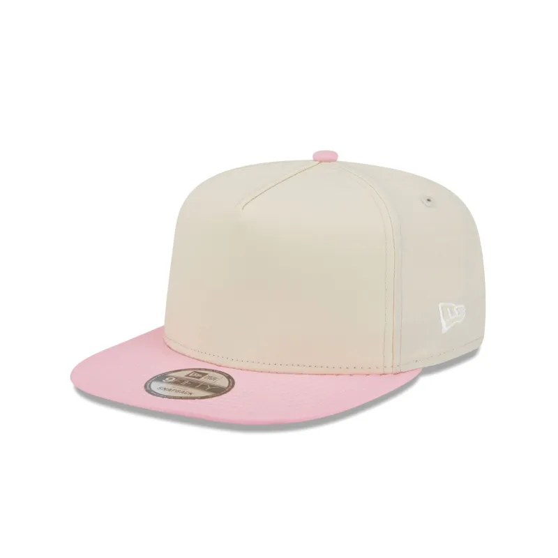 New Era Cap Cotton Nylon Pink Visor 9FIFTY A-Frame Snapback Hat sold by New Era
