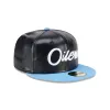 NFL Oilers Faux Leather Crown 59FIFTY Fitted Hat sold by New Era