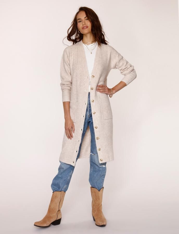 GINNY CARDI sold by Nica