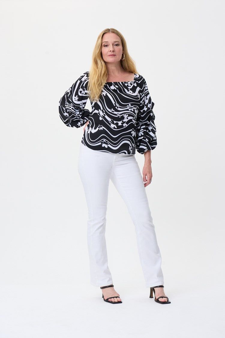 Puffy Tucked Sleeves Top sold by Nica