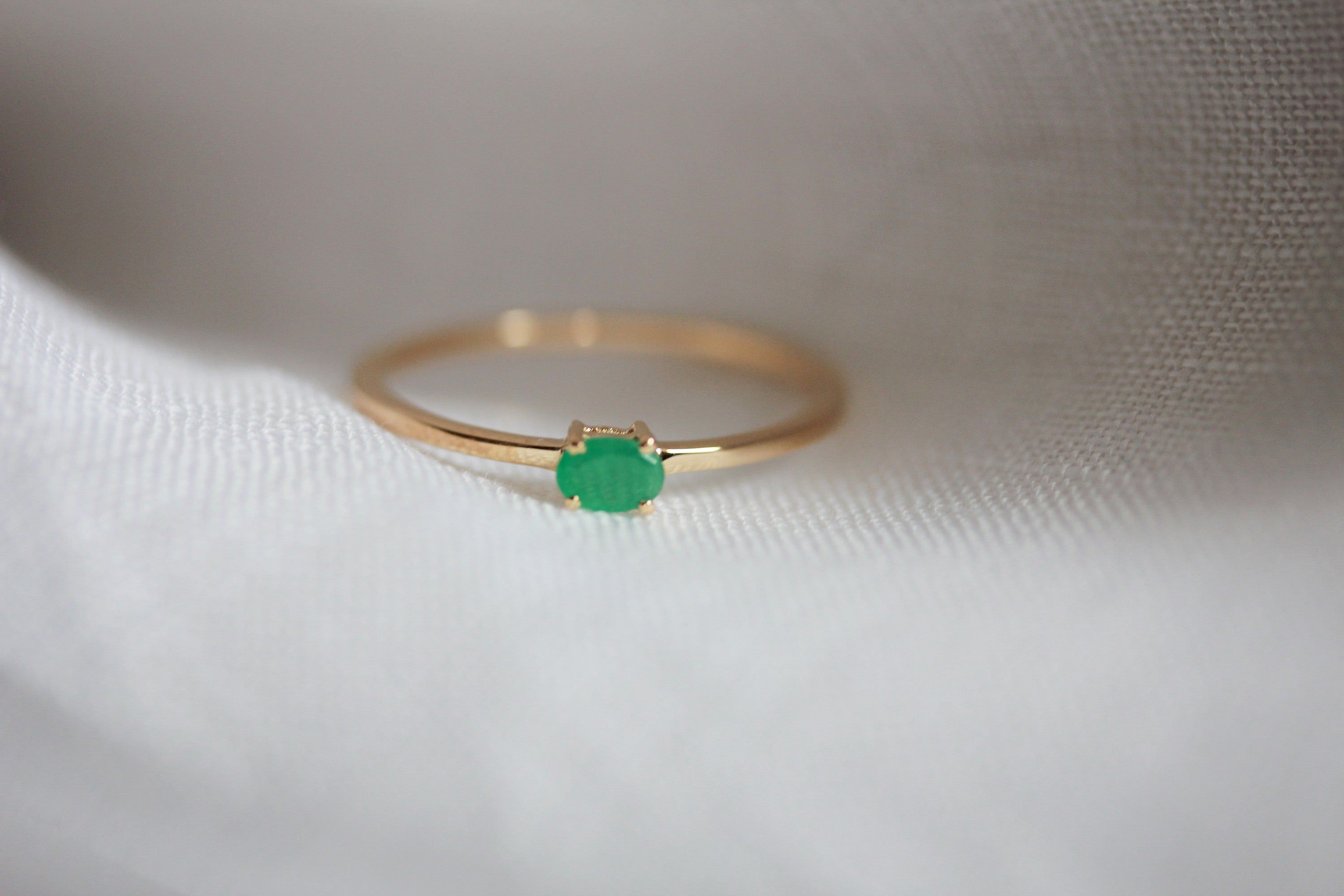 MINI GEM STACKING RING- EMERALD sold by Nica