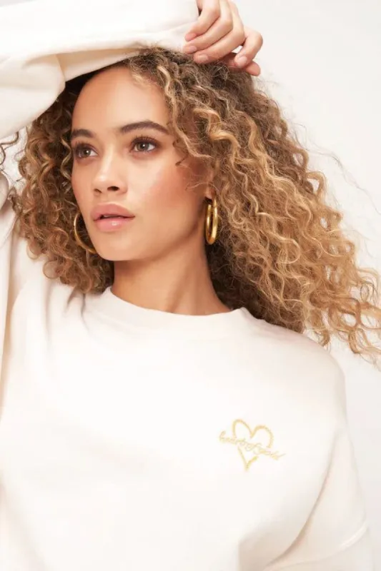 HEART OF GOLD EMBROIDERED OVERSIZED SWEATSHIRT sold by Nica
