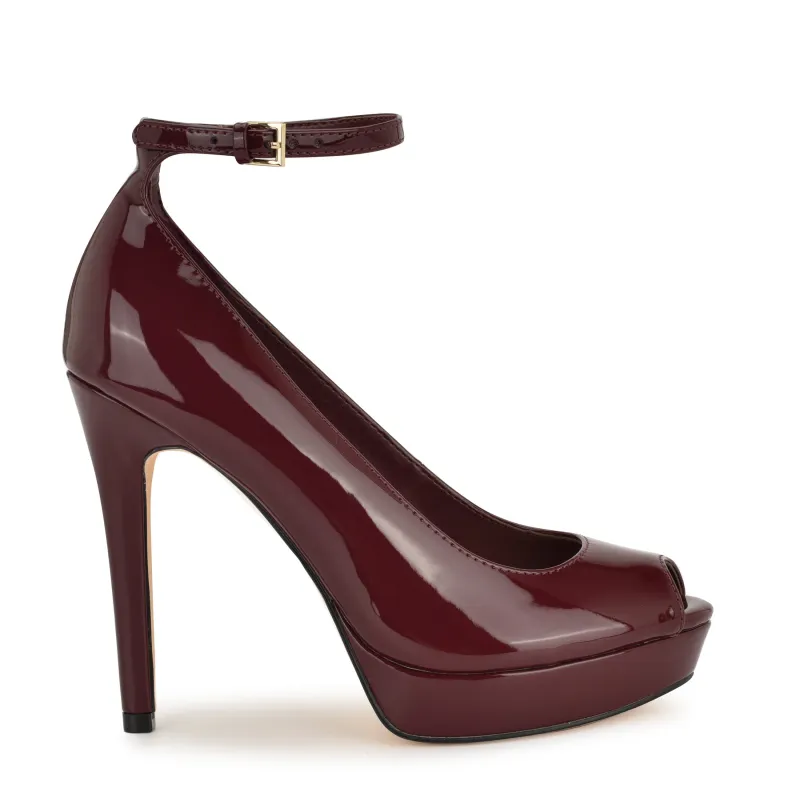 Hinko Peep Toe Platform Pumps sold by Nine West