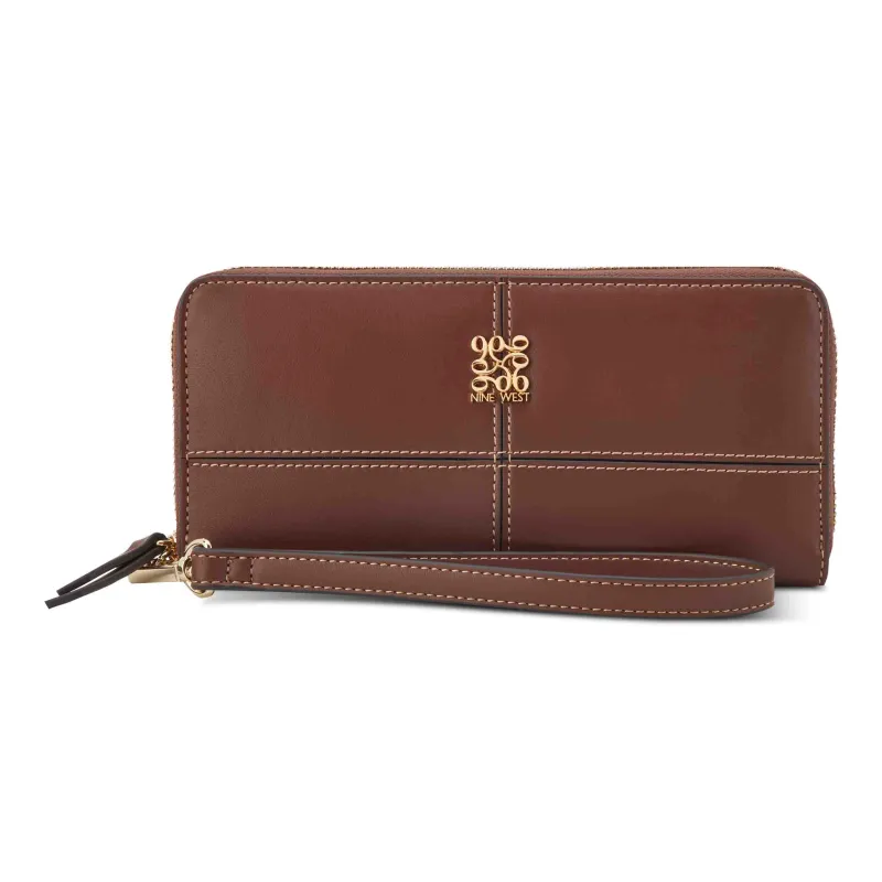 Paxtin Zip Around Wallet With Wristlet sold by Nine West