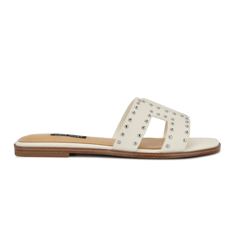 Giny Slip-On Flat Studded Sandals sold by Nine West