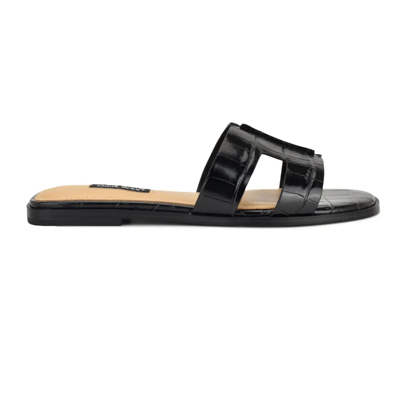 Giny Slip-On Flat Sandals sold by Nine West