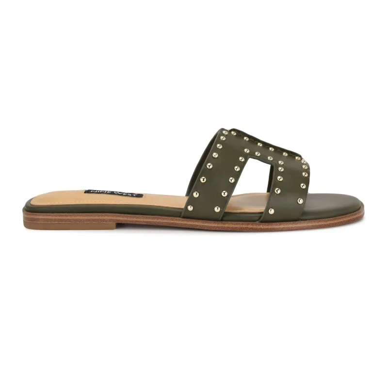 Giny Slip-On Flat Studded Sandals sold by Nine West