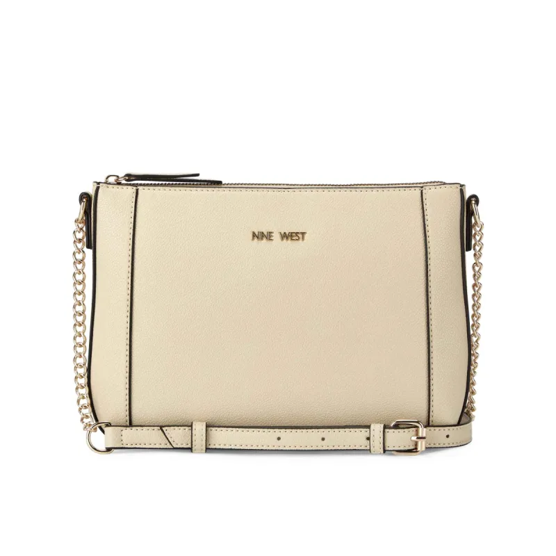 Basil Top Zip Crossbody sold by Nine West