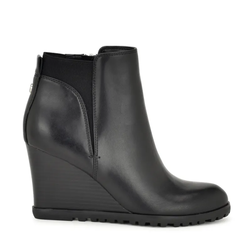 Curtis Wedge Booties sold by Nine West