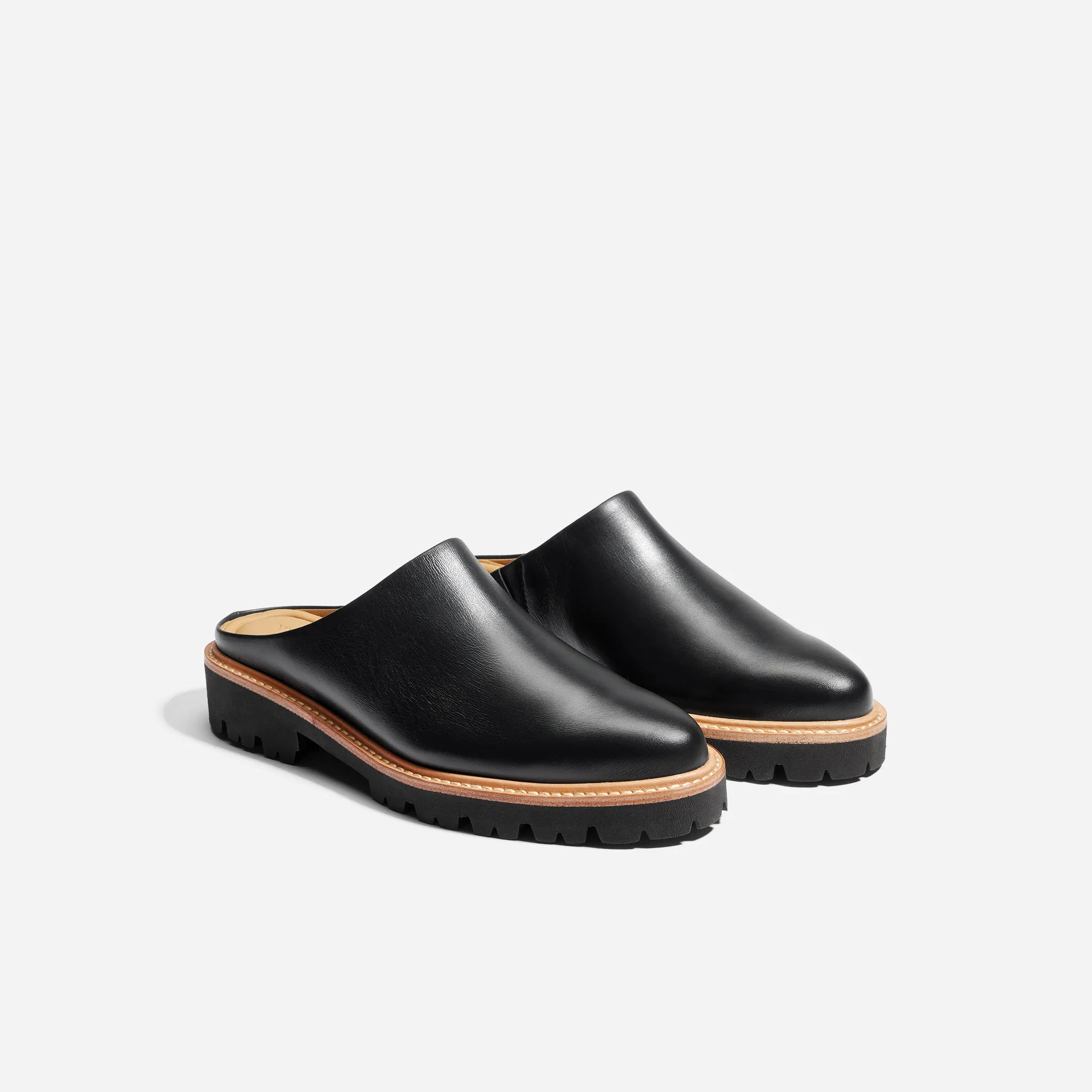 Emilee Lug Mule Black sold by Nisolo