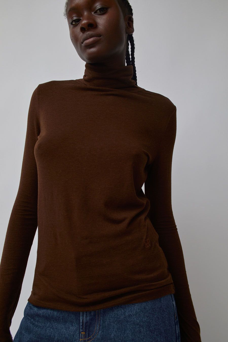 Mijeong Park Roll Neck Jersey Top in Dark Brown sold by No. 6