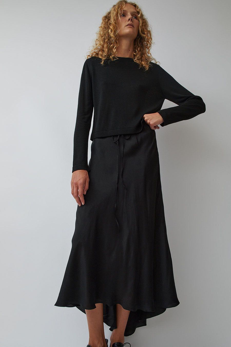 CORDERA Fluid Asymmetric Skirt in Black sold by No. 6
