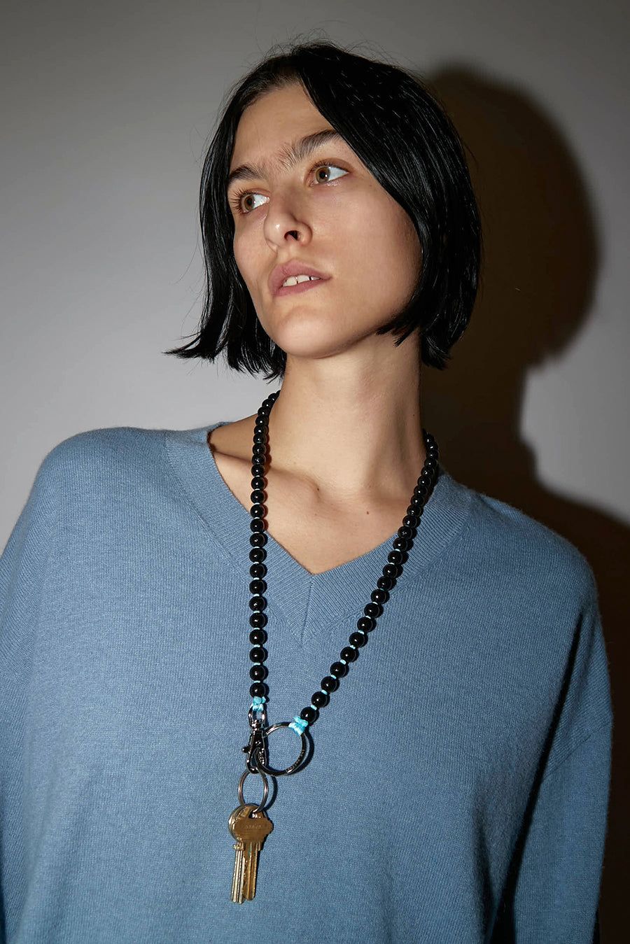 Ina Seifart Perlen Long Keyholder in Black with Light Turquoise Thread sold by No. 6