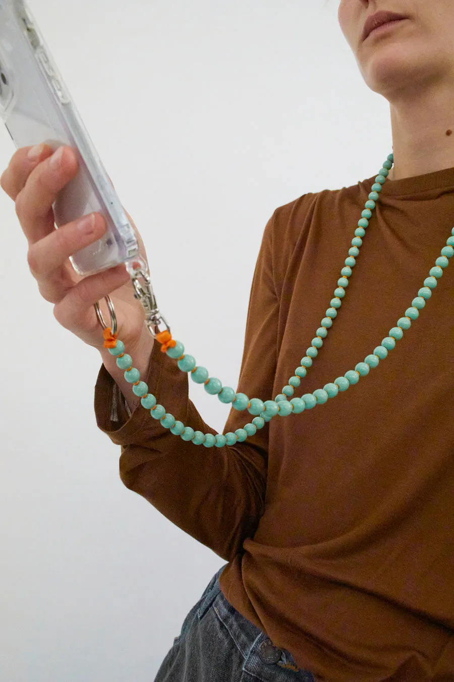 Ina Seifart Handykette Iphone Necklace in Pastel Green with Orange Thread sold by No. 6 product image thumbnail 4