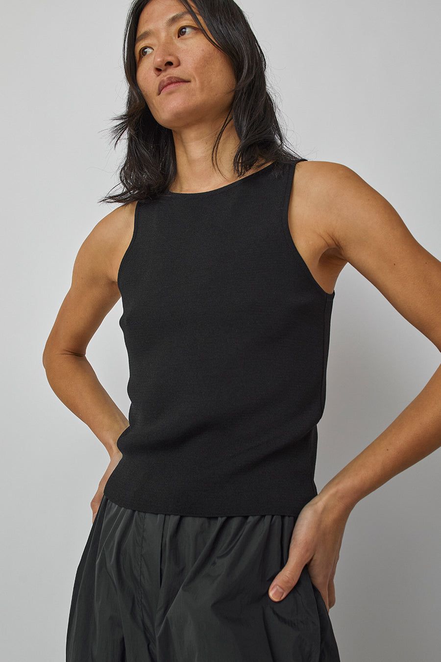 Amomento Cut-Out Sleeveless Top in Black sold by No. 6