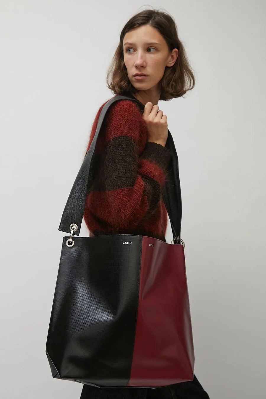 Cahu Diagonal Bigout Bag in Black and Burgundy sold by No. 6