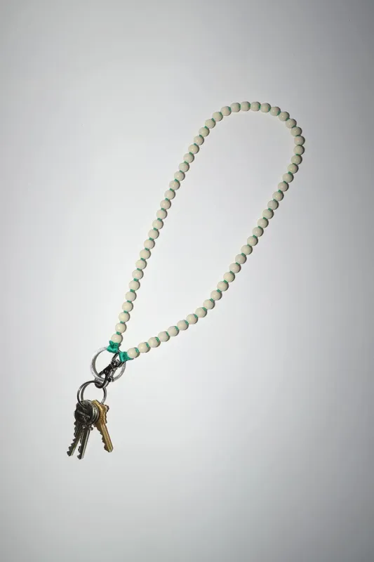 Ina Seifart Perlen Long Keyholder in Opal with Green Thread made by No. 6