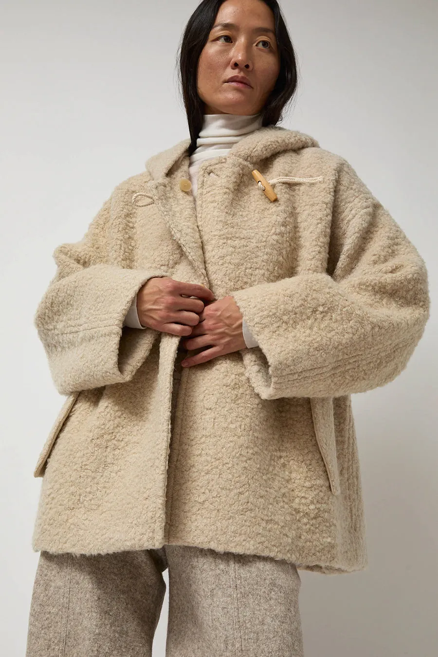 Anggae Fuzzy Hood Outer in Ivory sold by No. 6