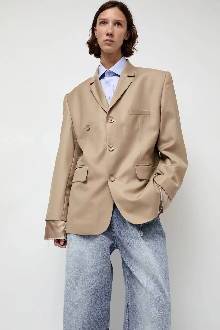 Highlight Studio Virgin Wool Single Breasted Blazer in Beige sold by No. 6