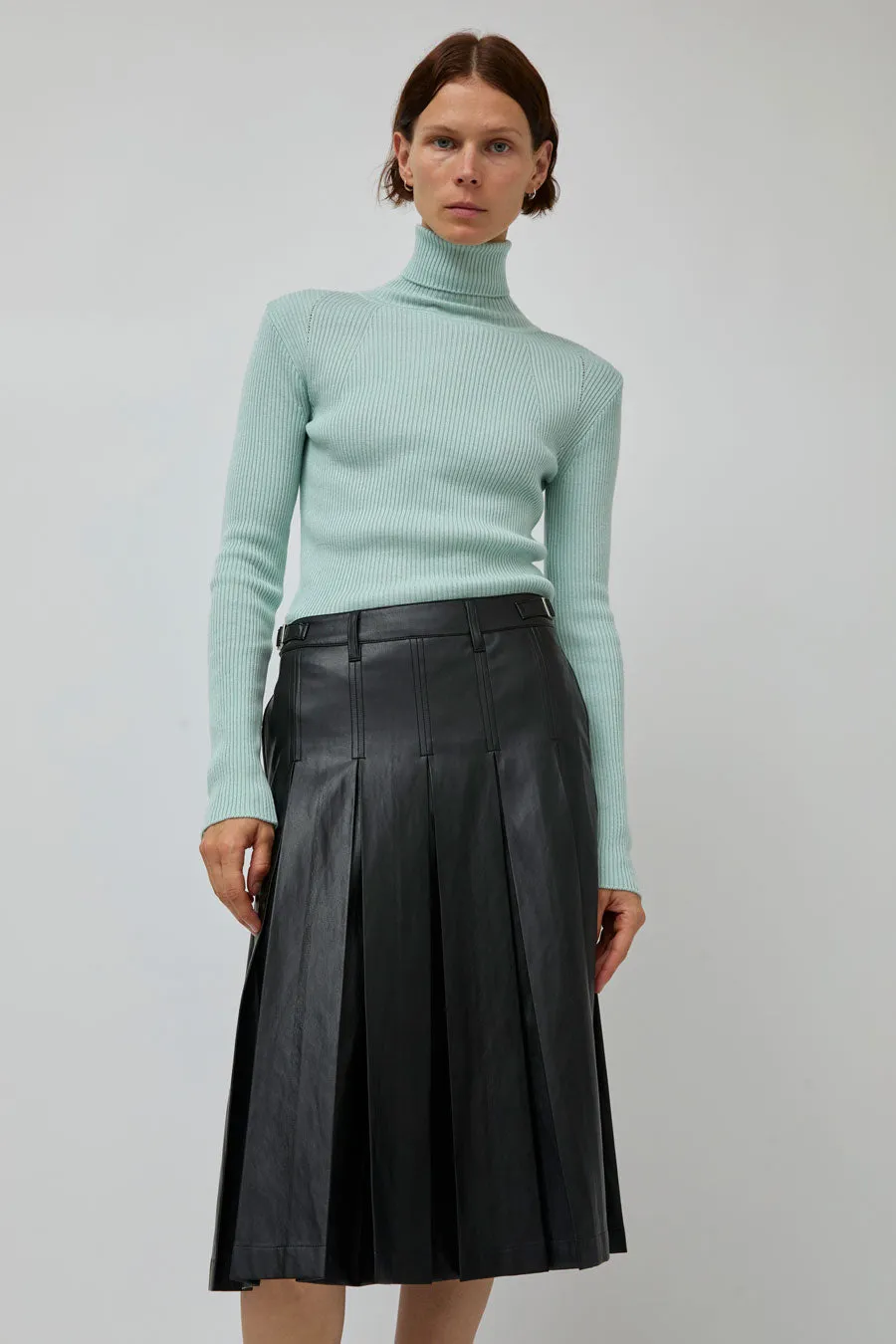 TONYWACK Faux Leather Pleated Midi Skirt in Black sold by No. 6