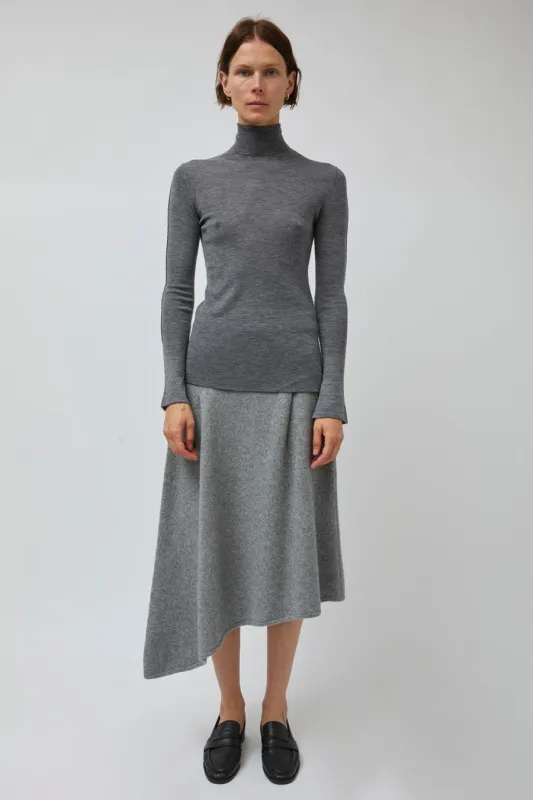 UMARMUNG Wool Cashmere Asymmetric Hem Skirt in Heather Grey sold by No. 6