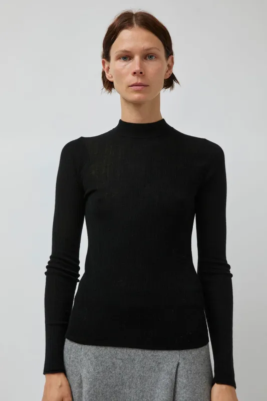 UMARMUNG Weightless Wool Crewneck Pullover in Black sold by No. 6