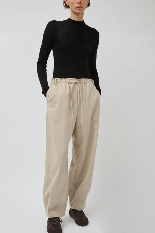 UMARMUNG Wool Flannel Oval Silhouette Pants in Cream sold by No. 6