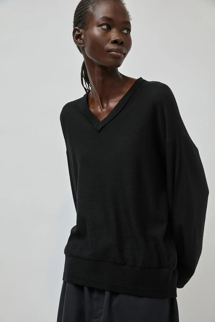 UMARMUNG Extra Fine Merino Wool V Neck Pullover in Black sold by No. 6