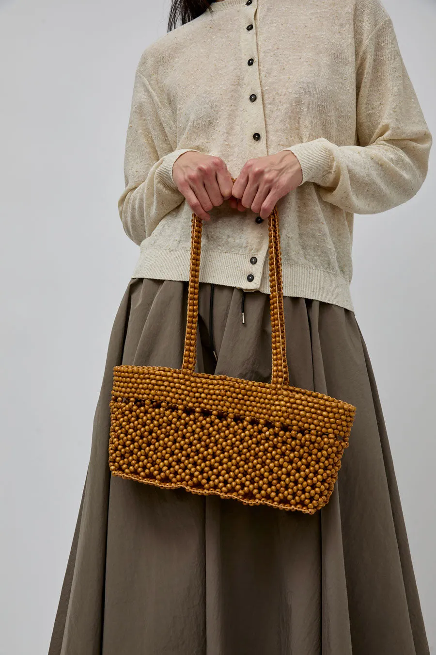 CORDERA Wooden Beads Mini Bag in Ochre sold by No. 6