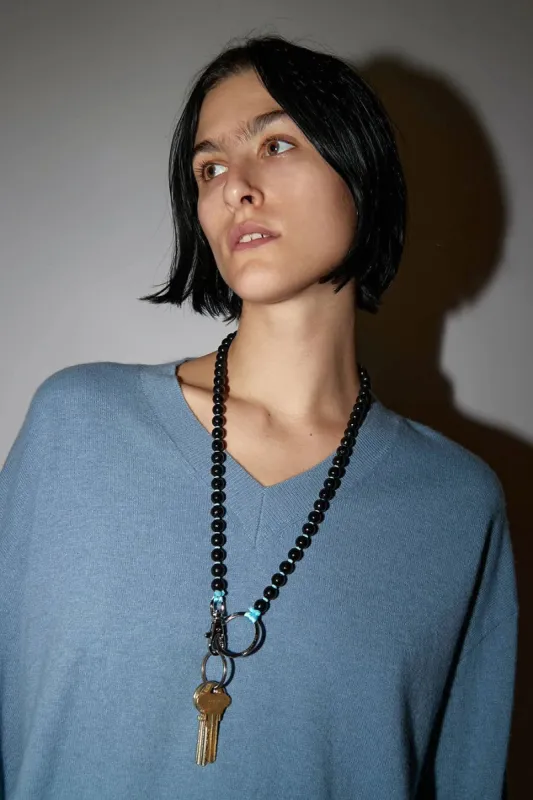 Ina Seifart Perlen Long Keyholder in Black with Light Turquoise Thread made by No. 6