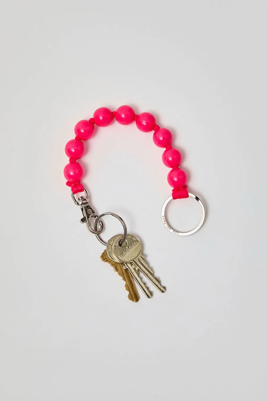Ina Seifart Dicke Perlen Short Keyholder in Neon Pink sold by No. 6