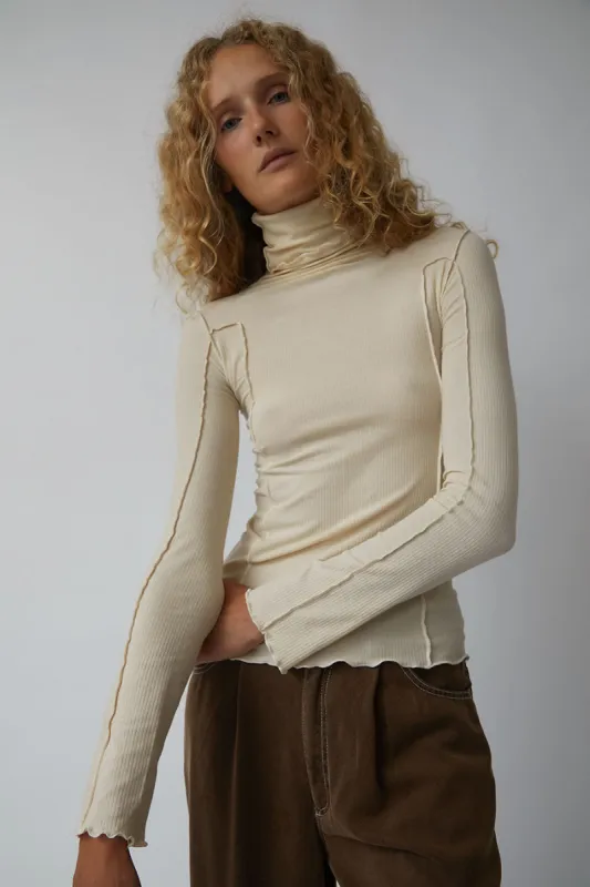 Baserange Omato Turtleneck in Off White made by Baserange