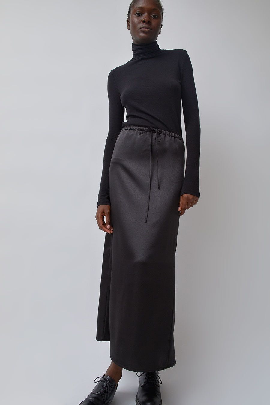Mijeong Park Stretch Satin Maxi Skirt in Black sold by No. 6