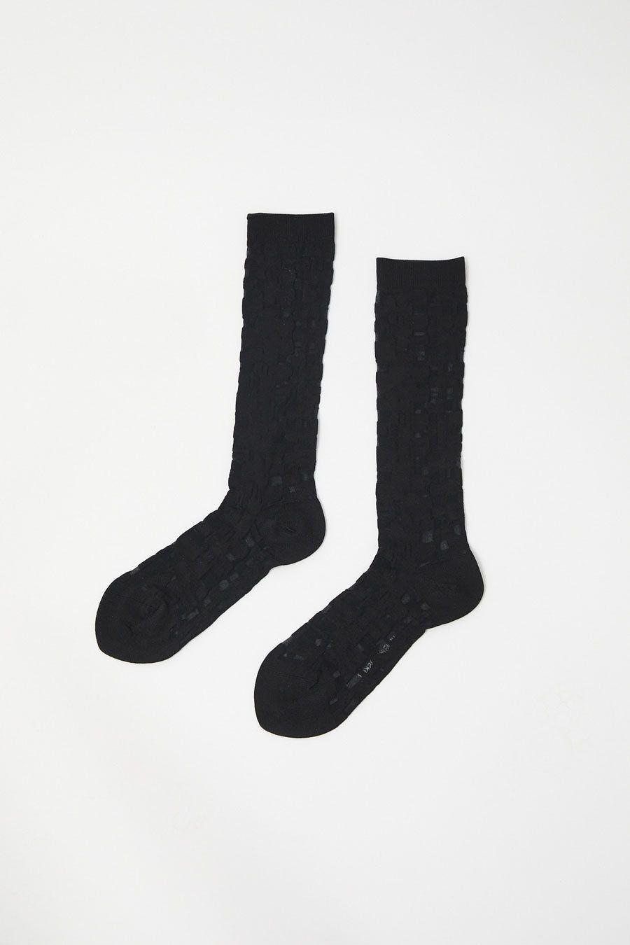 Henrik Vibskov Unboxing Socks Femme in Transparent Black sold by No. 6