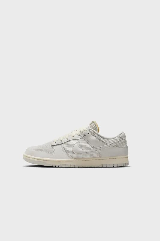 Dunk Low Phantom/Light Bone-Sail HF4297-001 sold by Nomad
