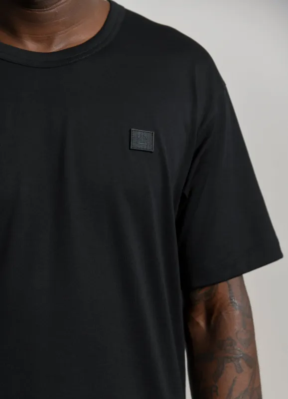Face Logo Tee Black 25E173 sold by Nomad