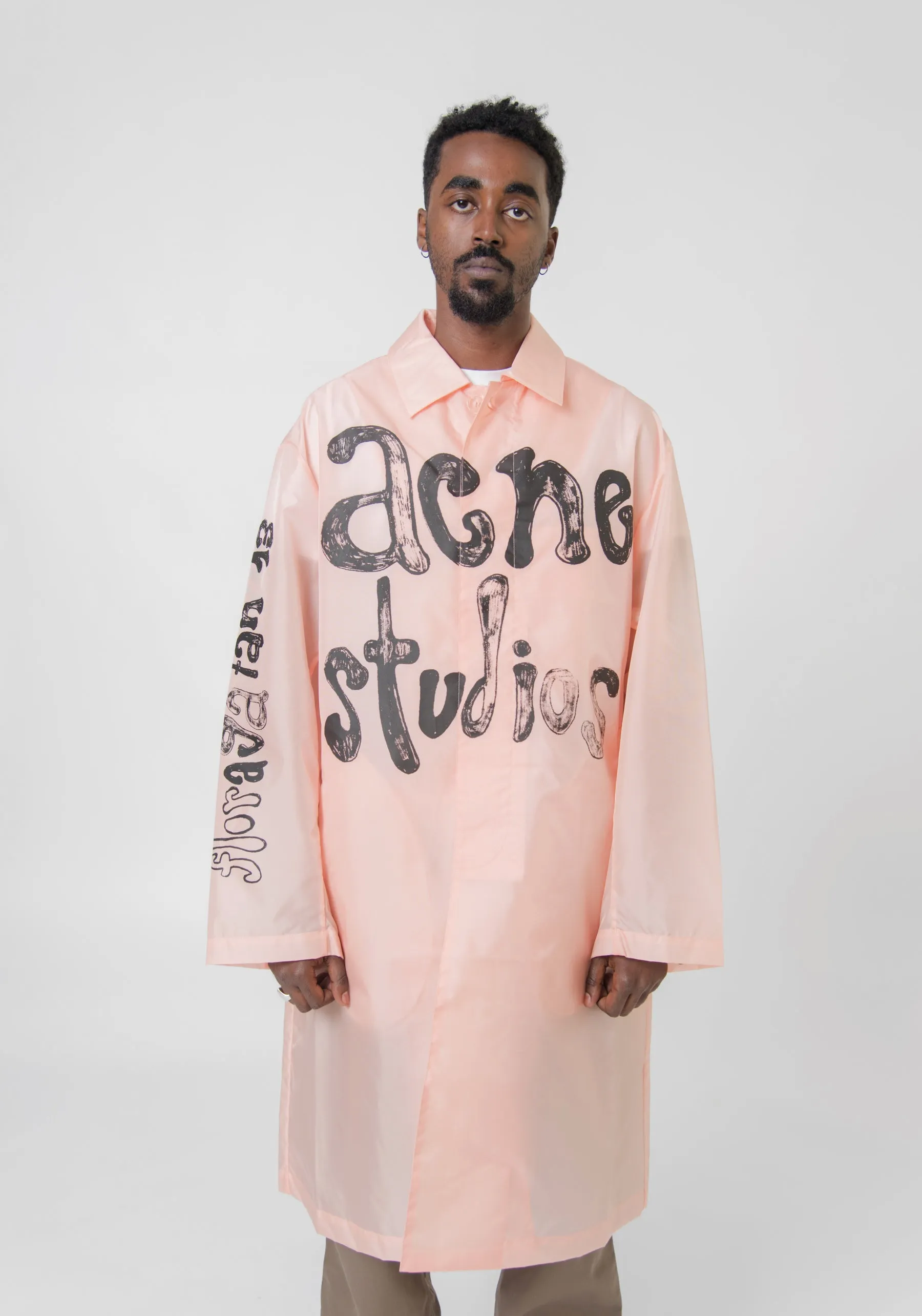 Nylon Logo Coat Peach Pink OUTW000973 sold by Nomad